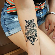 Load image into Gallery viewer, fresh jagua ink realistic looking temporary owl tattoo on girl with shorts..