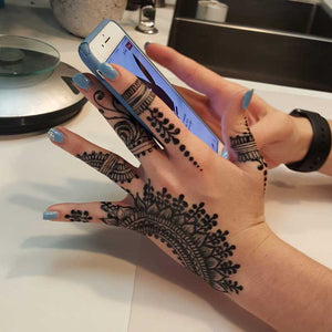 Traditional hand henna design with jagua ink