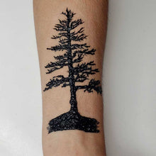 Load image into Gallery viewer, Jagua henna pine tree temporary tattoo made with fresh jagua gel.