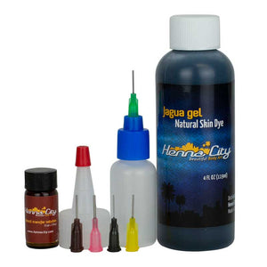 Natural jagua henna temporary tattoo ink with applicator bottle and tips.