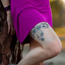 Load image into Gallery viewer, Flower vine jagua ink tattoo on girls leg